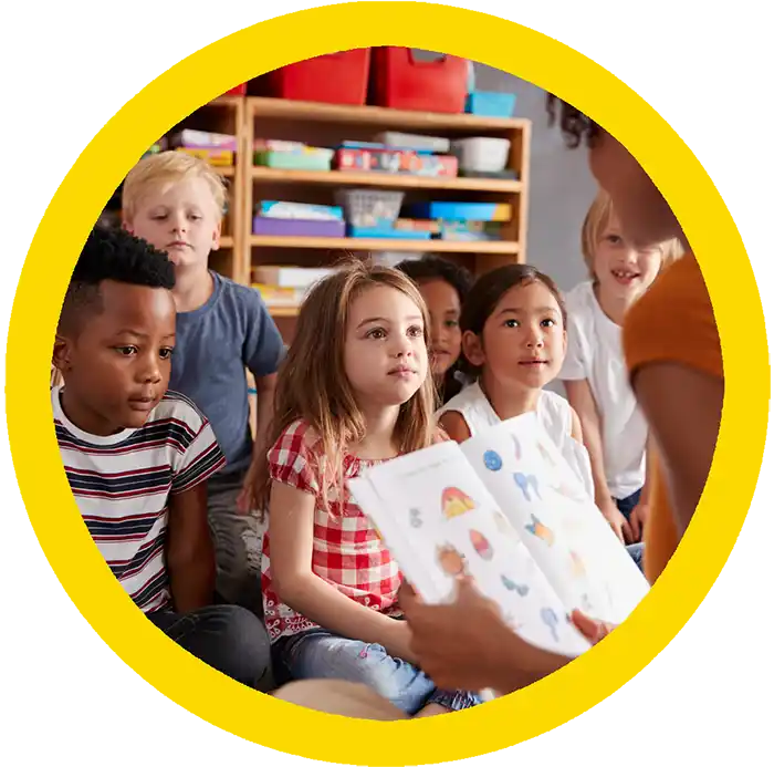 Teacher in classroom with kids