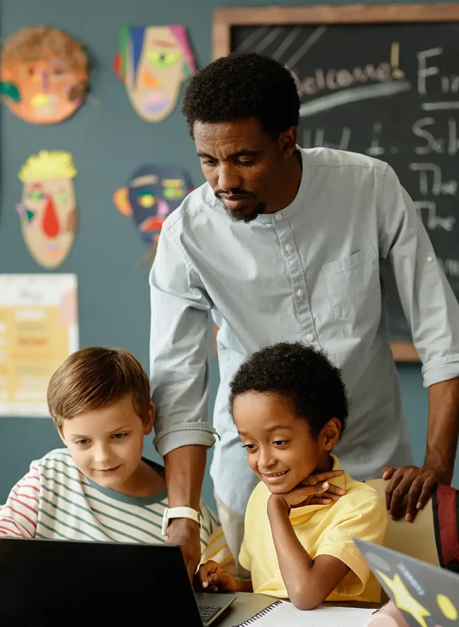 Teacher in classroom with kids