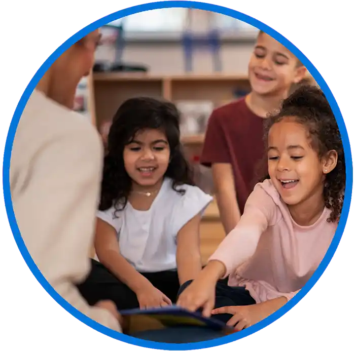 Teacher in classroom with kids