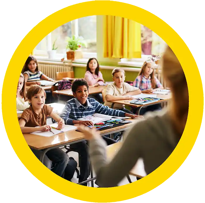 Teacher in classroom with kids